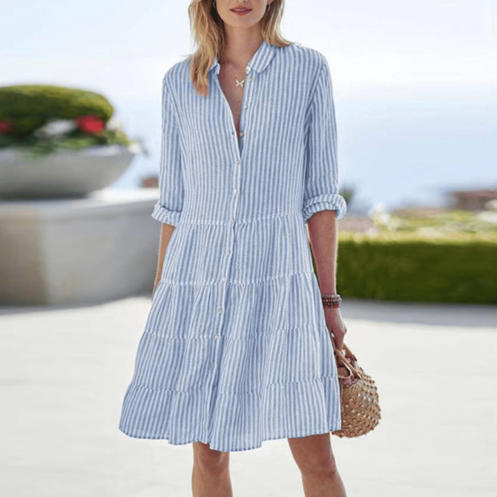 Stylish women's striped collared button-down midi dress. Tiered skirt, three-quarter sleeves for a chic, comfy look.