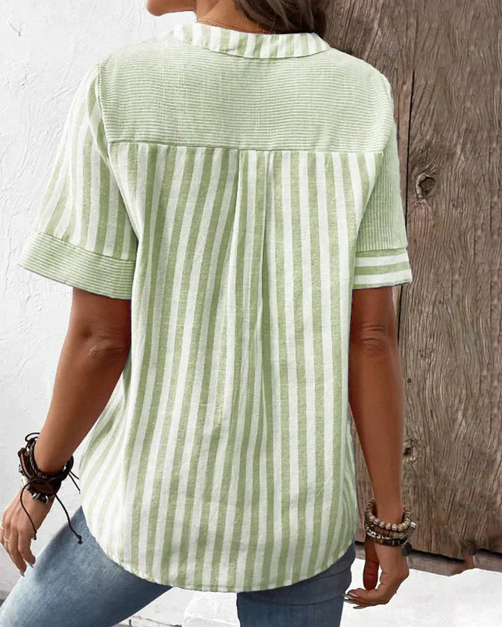 Comfortable women's short sleeve striped & colorblock shirt, offering an effortless chic and stylish appeal.