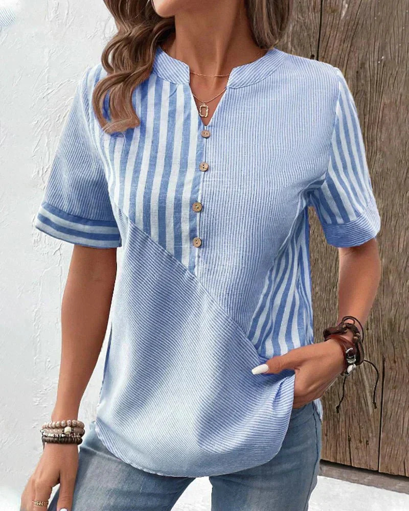 Chic women's half-button blouse in a striped colorblock pattern, short sleeves, perfect for everyday style.