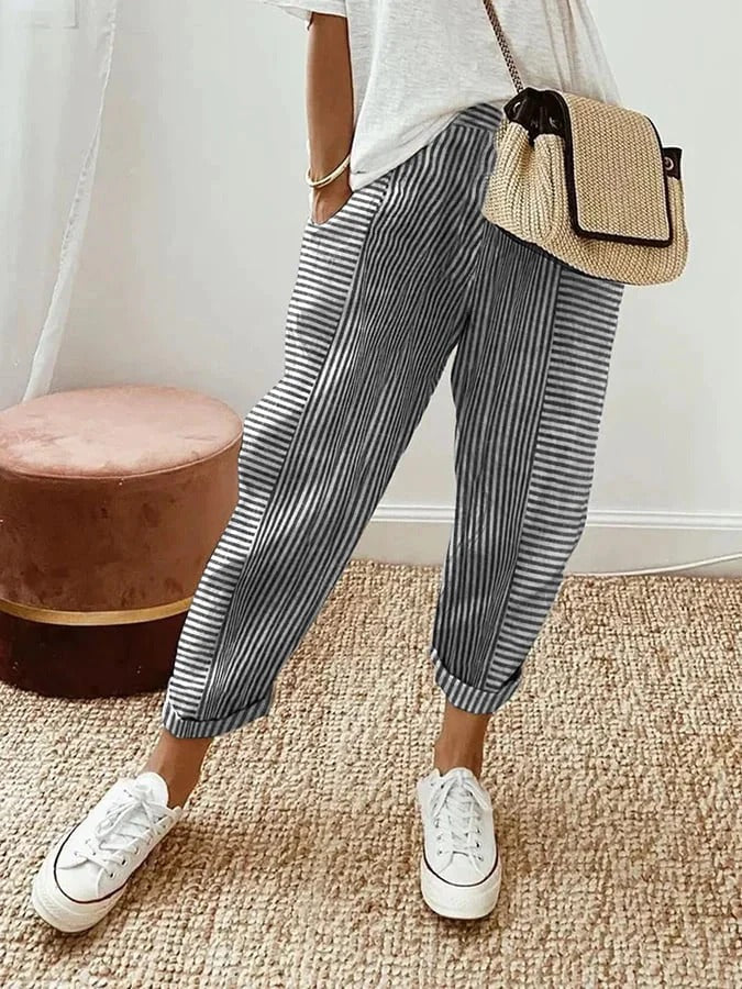 Spring/Summer women's striped cropped pants. Fashionable straight leg, mid-rise design with pockets for a chic, casual look.