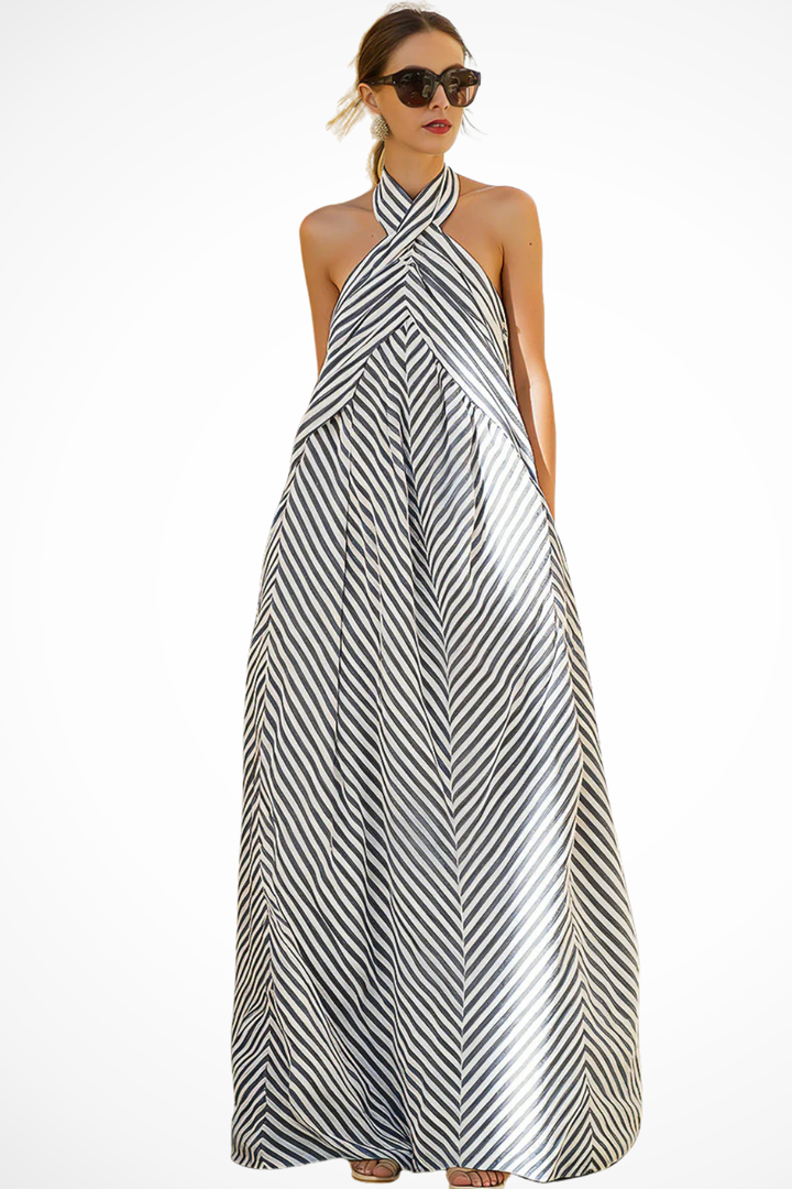 Flowing women's striped halter maxi dress, ideal for comfortable summer wear and beach outings.