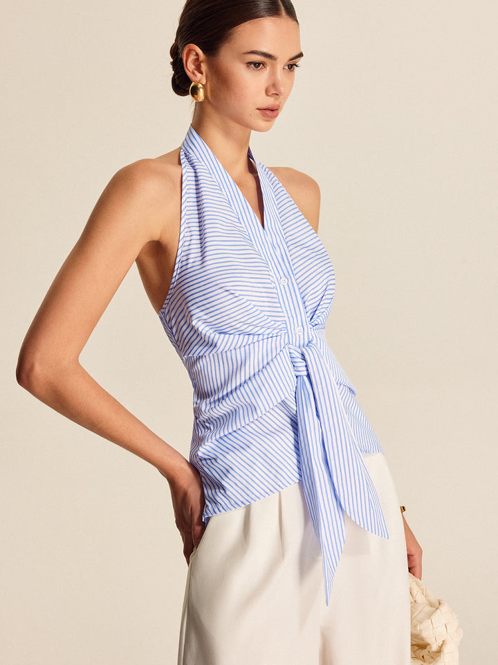 Sleeveless women's striped halter top with a flattering tie-front. Versatile for work, office or casual summer days.
