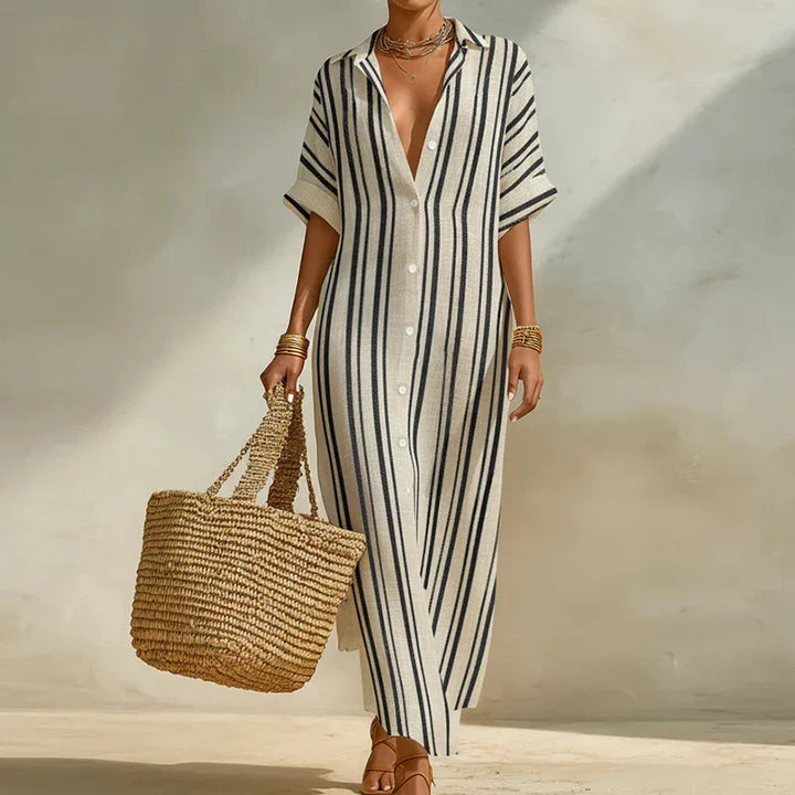 Women's striped long shirt dress with V-neck & three-quarter sleeves, perfect for casual summer wear.