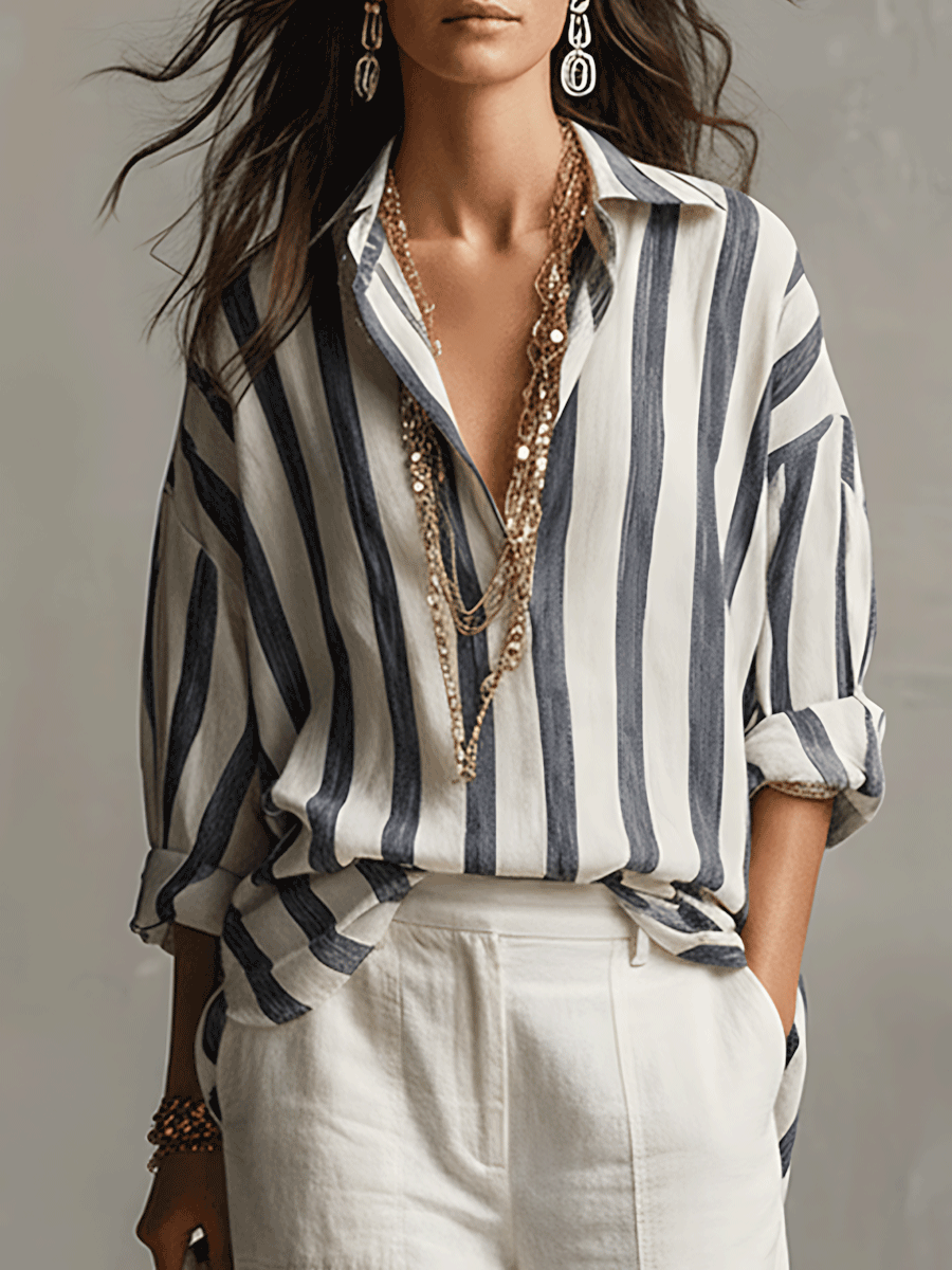 Women's striped long sleeve blouse with button front. Casual, relaxed fit for everyday wear.