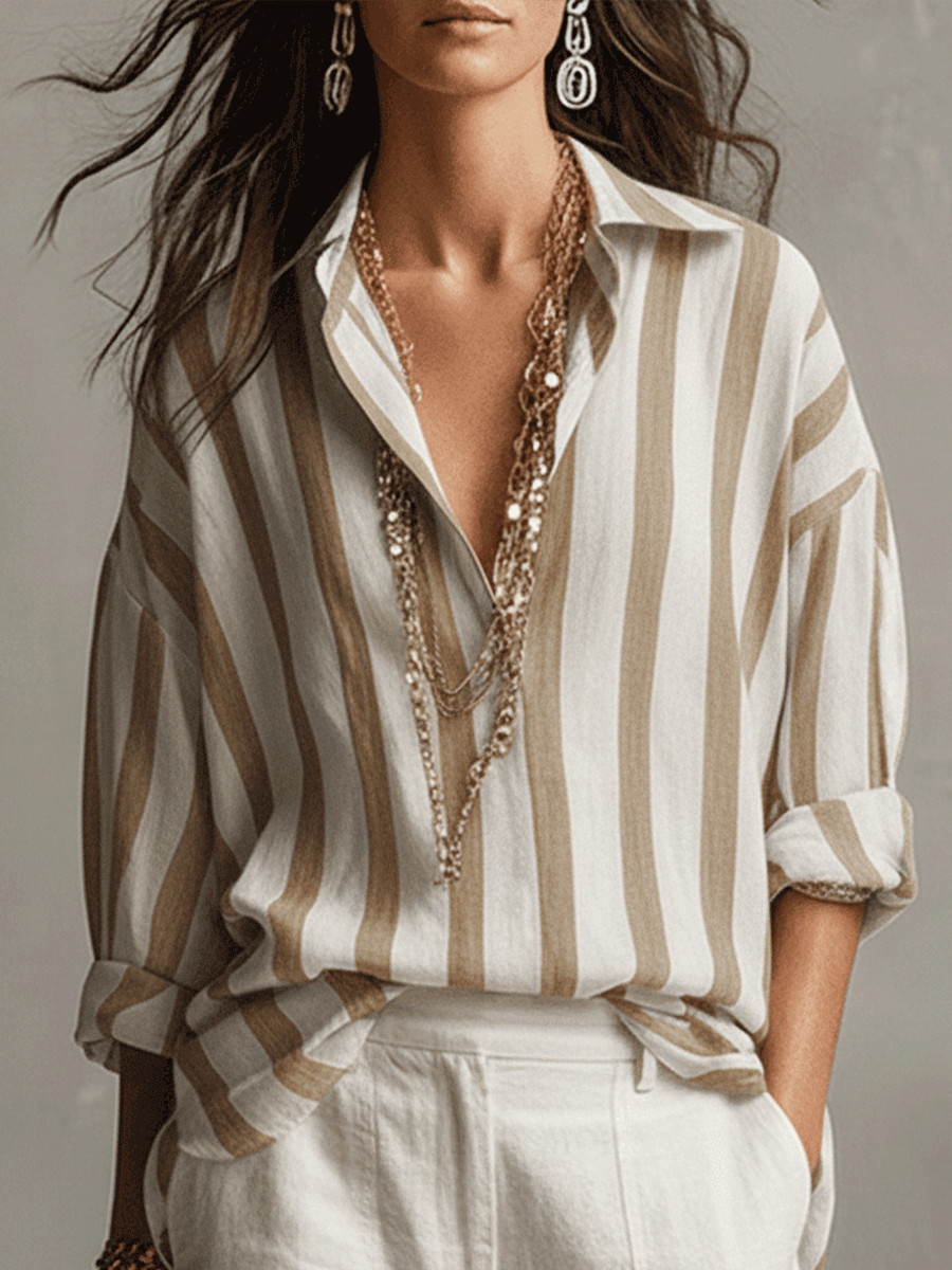 Versatile women's striped button-front blouse. Long sleeves, perfect for smart casual or relaxed fashion.
