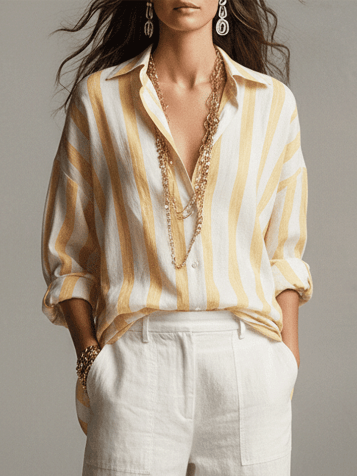 Stylish women's striped button-front top. Long sleeves offer comfort for versatile, relaxed everyday fashion.