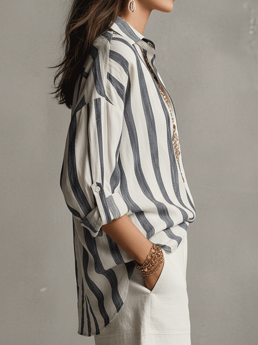 Elegant women's striped long sleeve blouse with a full button front. Perfect for a fashionable, relaxed fit.