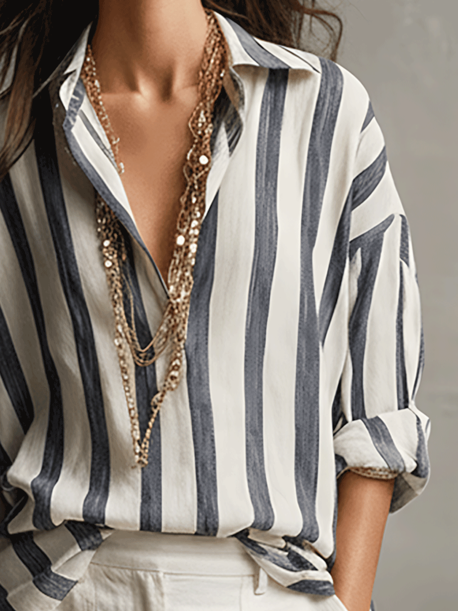 Fashionable women's striped long sleeve blouse. Button-front detail for a smart casual or relaxed everyday style.