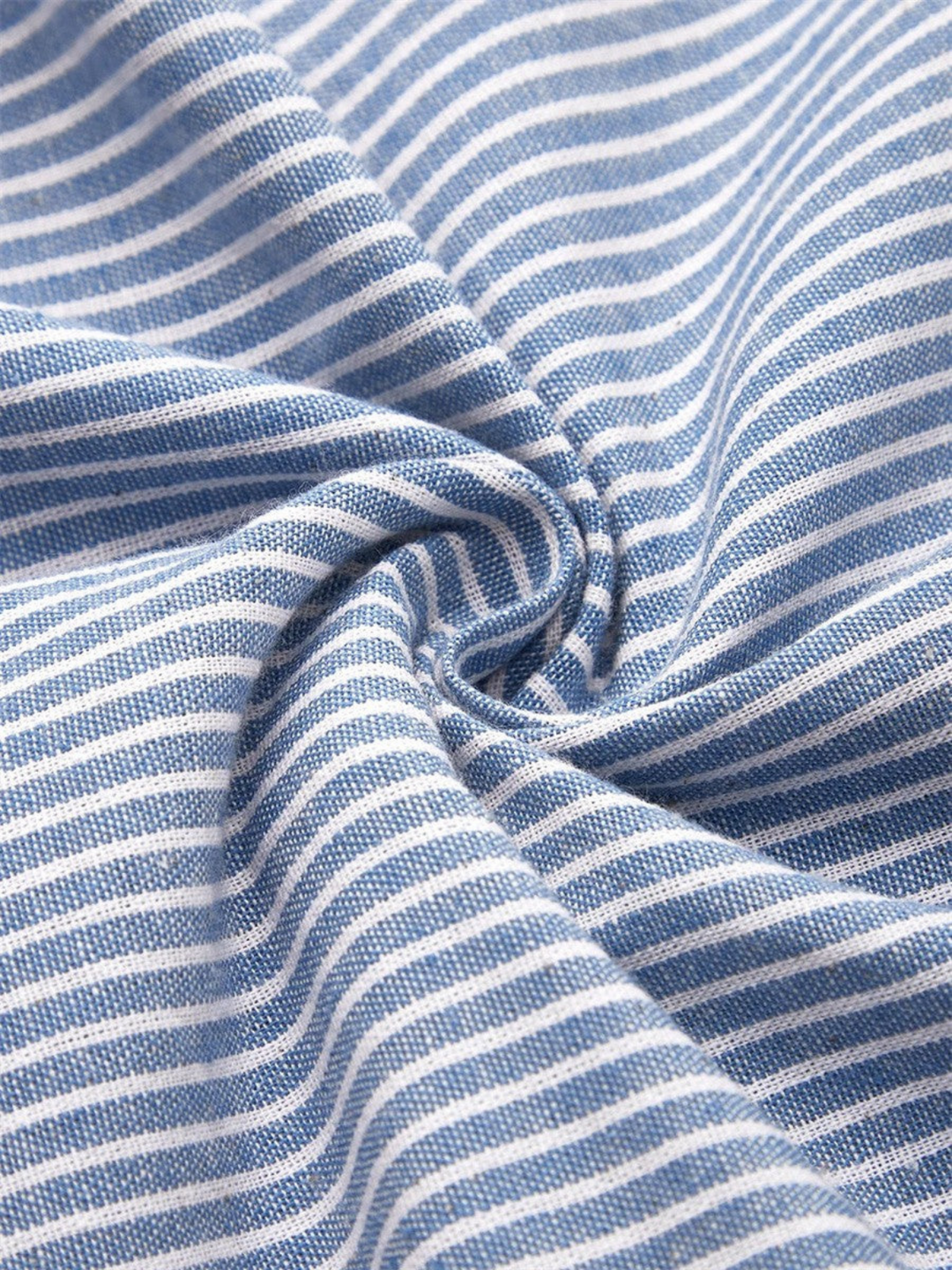 Stylish striped midi dress for women, featuring button accents & pockets. Ideal for casual outings or work.
