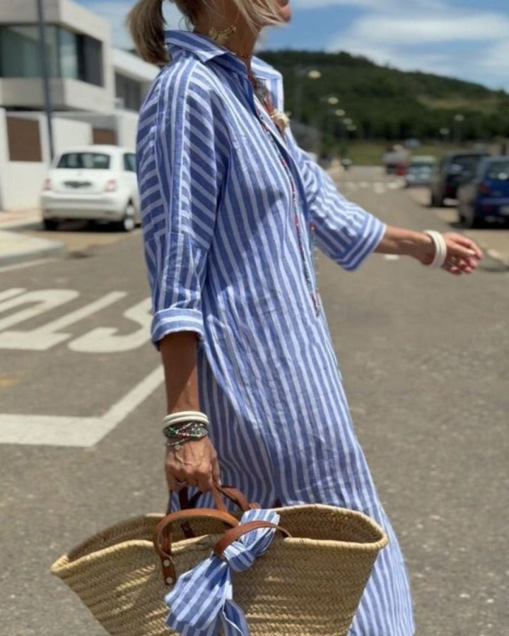 Striped button-up shirt dress for women, midi length. Includes pockets. A versatile, comfortable grey dress for spring & summer.