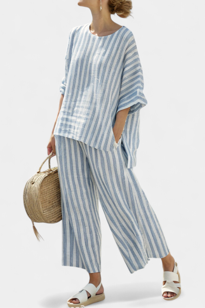 Women's striped oversized batwing top and wide-leg pant set, perfect for summer comfort & resort style.