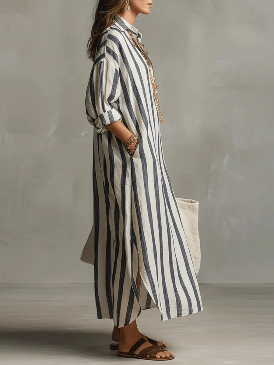 Flowy striped oversized maxi dress for women, ideal as a casual beach cover-up or vacation outfit.