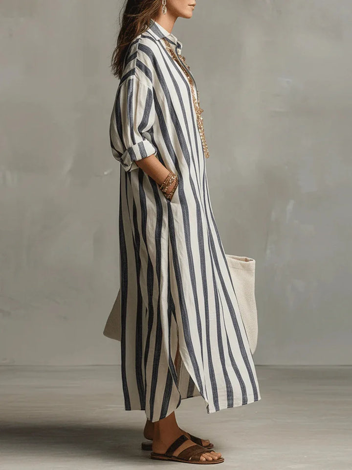 Flowy striped oversized maxi dress for women, ideal as a casual beach cover-up or vacation outfit.