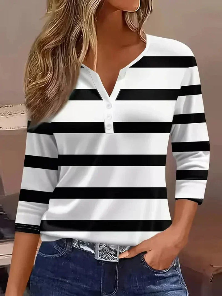 Elegant striped V-neck 3/4 sleeve top for women. Fashionable & comfortable casual blouse for spring/summer.