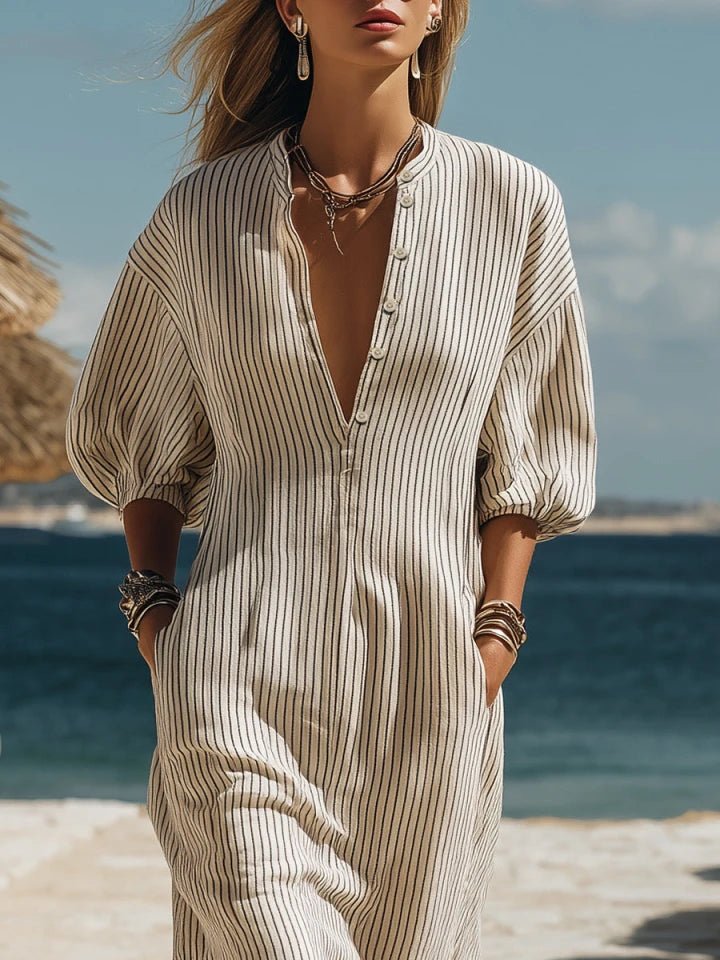 Effortless women's casual striped maxi dress with a stylish V-neck and puff sleeves.
