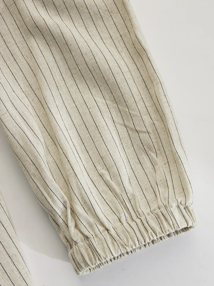 Casual striped button-down maxi dress for women, featuring puff sleeves and a stylish side split.