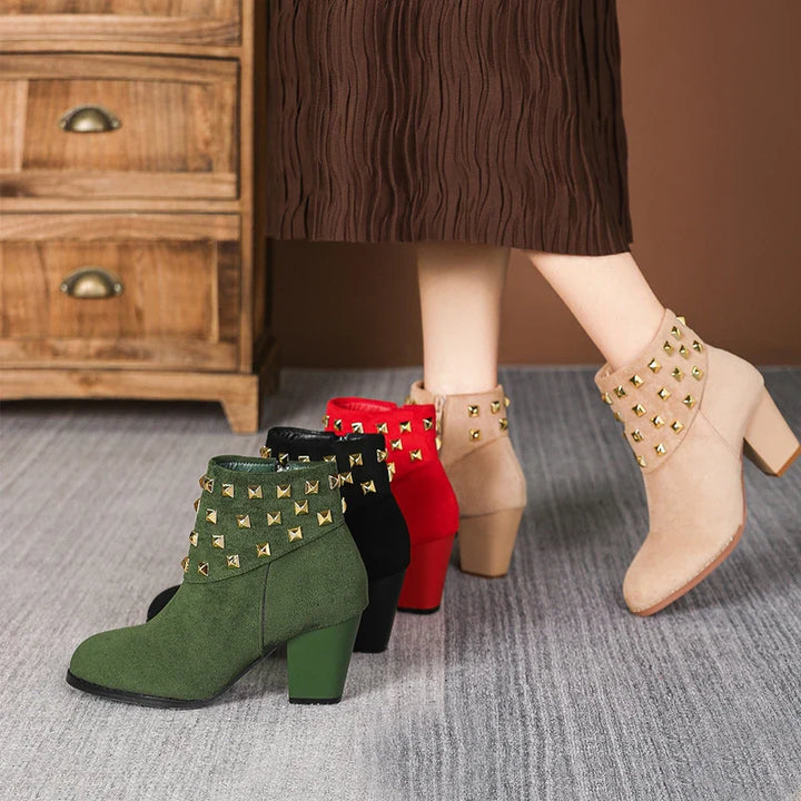 Women's studded ankle boots with a comfortable block heel. Ideal for casual fashion and style.