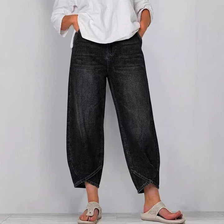 Modern fit women's barrel leg cropped jeans, featuring a unique curved silhouette. Perfect casual denim pants.
