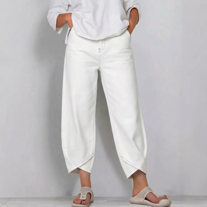 Chic women's barrel leg cropped jeans, mid-rise and stylish. Modern fit denim casual pants for any occasion.