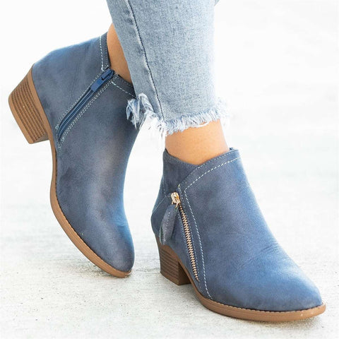 Pair of women's chic grey zip-up ankle boots, perfect for everyday style and comfort