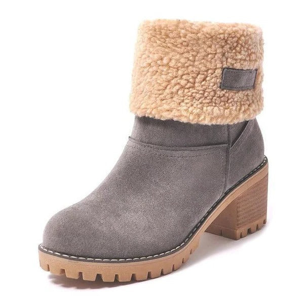 Women's warm block heel snow boots with traction, ideal for cold weather & winter fashion. Slip-on waterproof design.