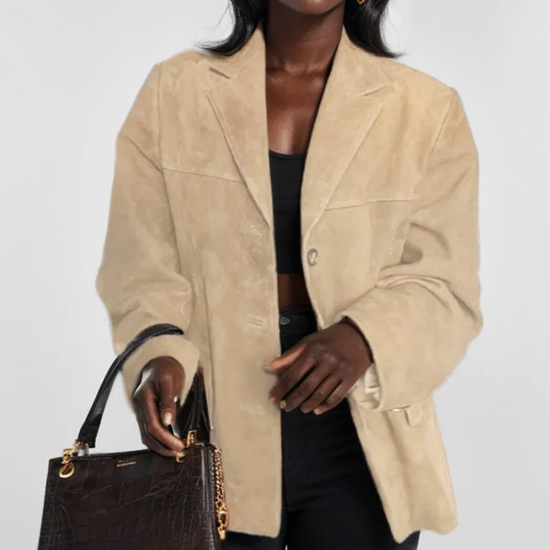Chic women's button-down blazer, a versatile outerwear jacket for professional or casual outfits.