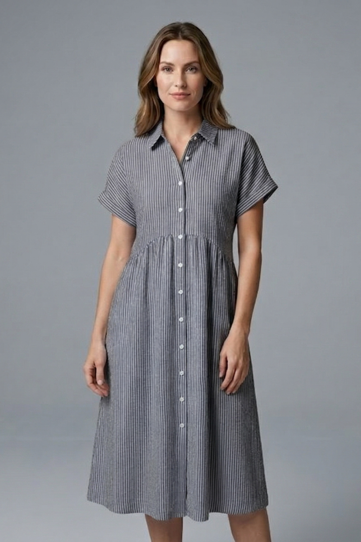 Stylish women's spring midi dress with button details and a flattering collar.