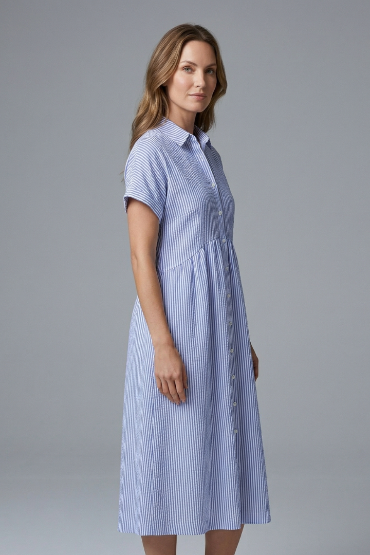 Chic button-front midi dress, ideal for spring fashion and everyday style.