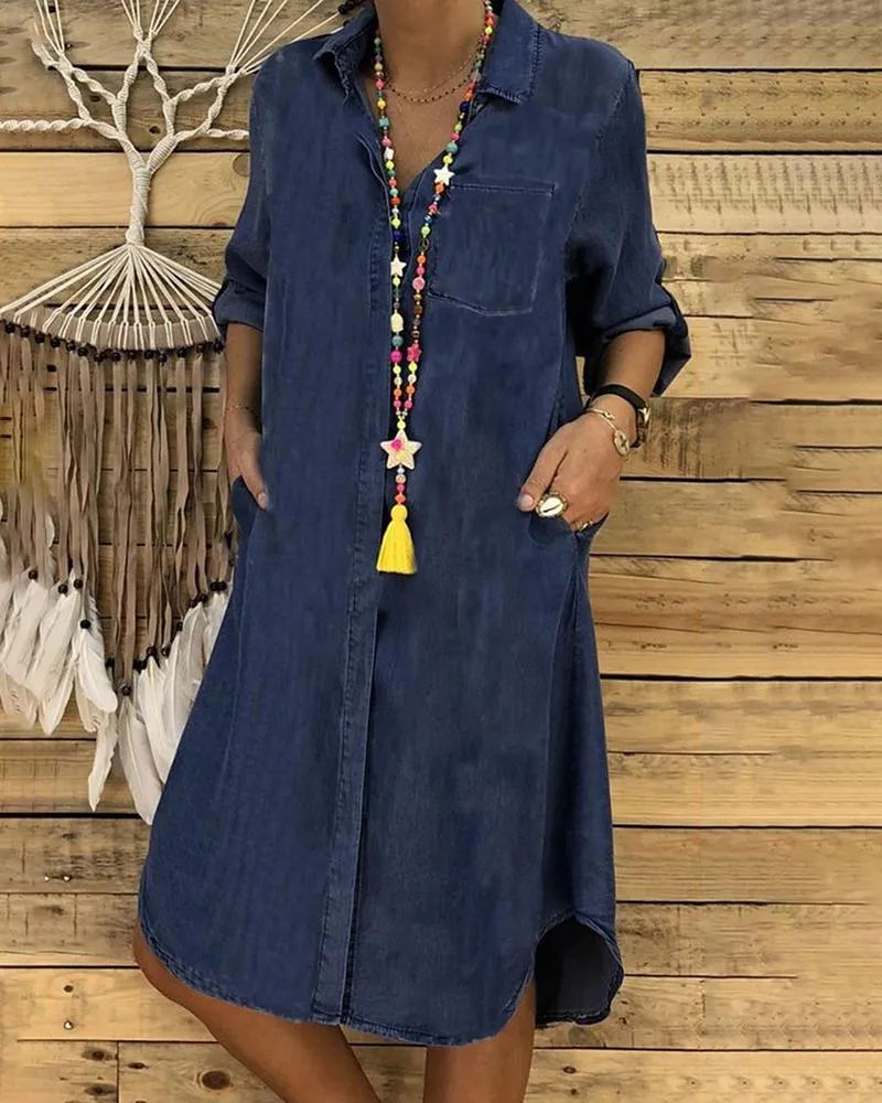 Casual women's short jean-style dress featuring a full button front, collar, and functional pockets for day wear.