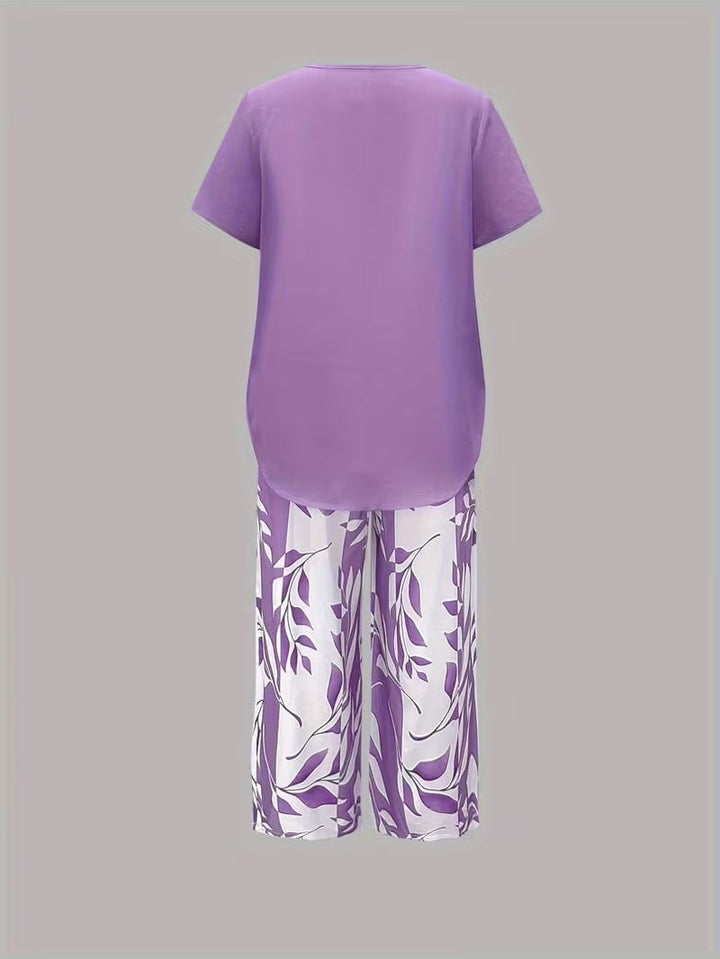 Elegant women's leaf print pant co-ord, a versatile two-piece set for sophisticated summer fashion.
