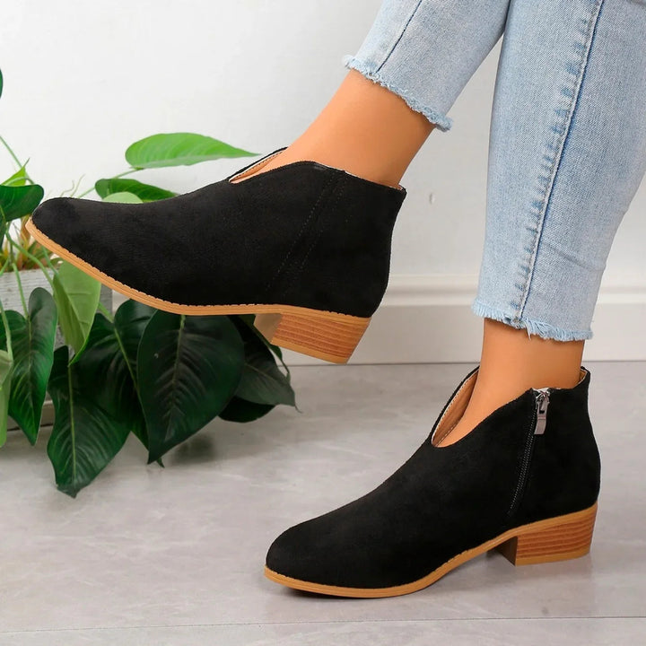 Stylish women's fall boots: leopard print ankle boots with a convenient zipper closure for easy wear.
