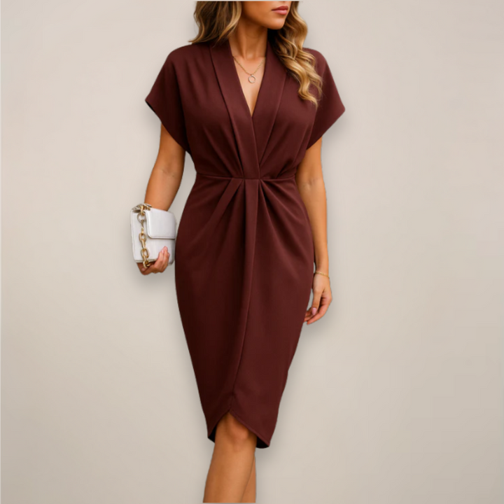 Comfortable & stylish women's midi wrap dress, offering a chic, flattering look.