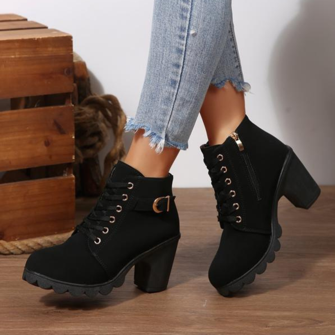 Women's stylish orthopedic ankle boots with supportive design & comfortable block heel for everyday wear.