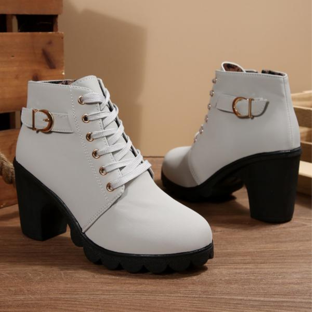 Women's supportive lace-up ankle boots; orthopedic design ensures comfort & style for everyday wear.