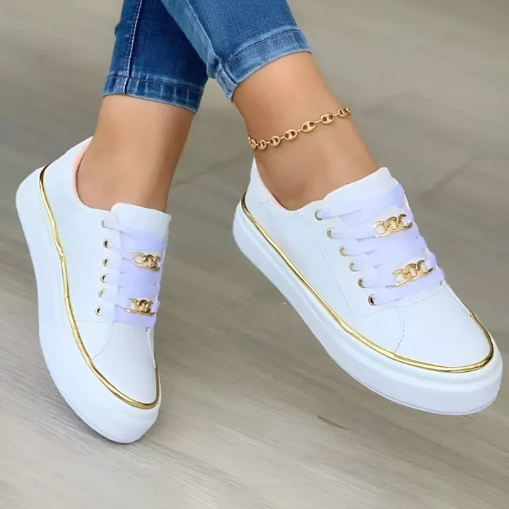 Women's stylish orthopedic sneakers, modern design, comfort, arch support & shock absorption for everyday wear.