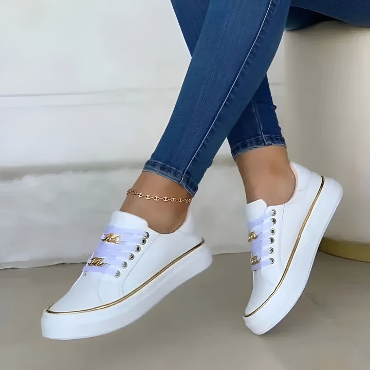 Woman walking in comfortable orthopedic sneakers, highlighting support & shock absorption for active lifestyles.