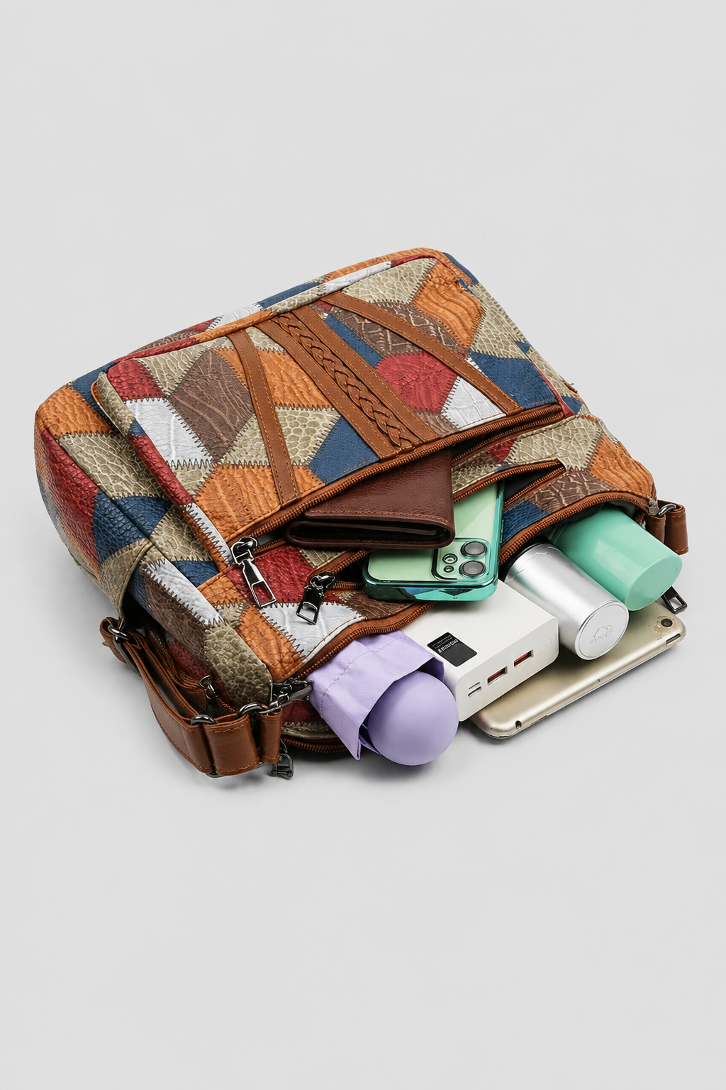 Chic women's patchwork shoulder bag, an artistic fashion handbag designed for unique everyday style & elegance.