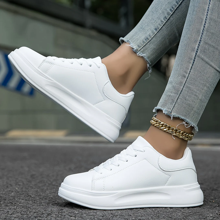 Women's stylish platform lace-up sneakers in white, perfect for casual fashion and an elevated look.