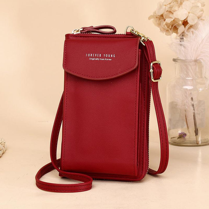 Women's stylish PU leather crossbody pouch wallet with gold-tone hardware, front view