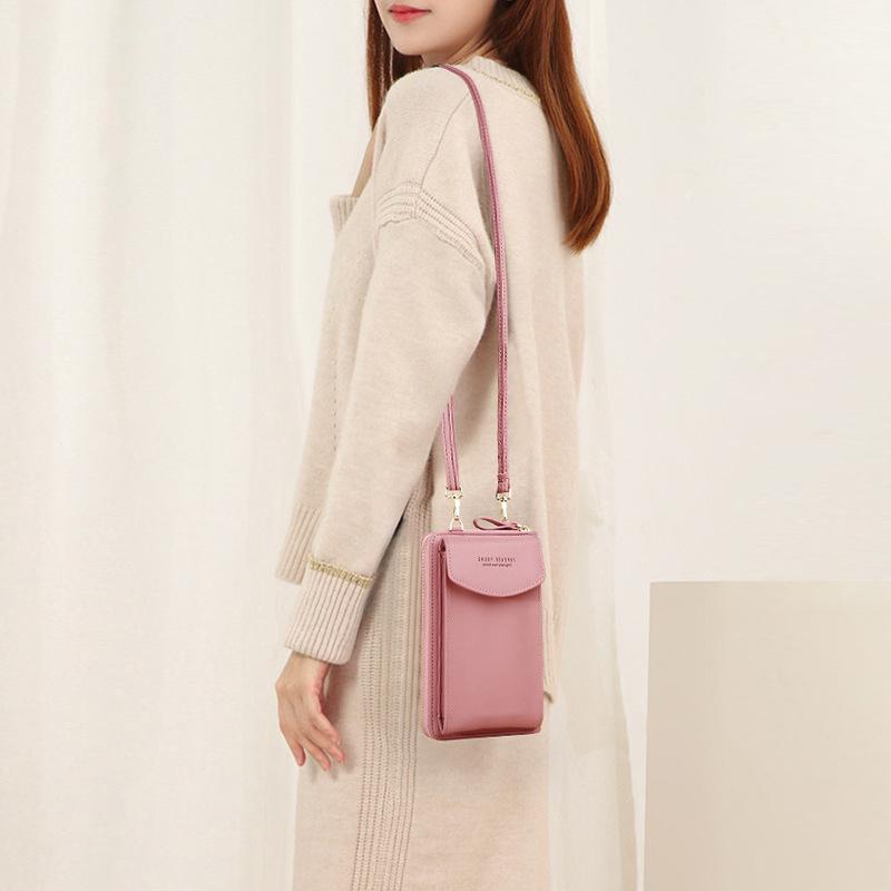 Portable PU leather phonebag for women, featuring a secure zip closure, side view