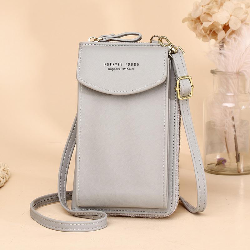 Gift-ready women's portable crossbody wallet, presented in a clean, professional setting