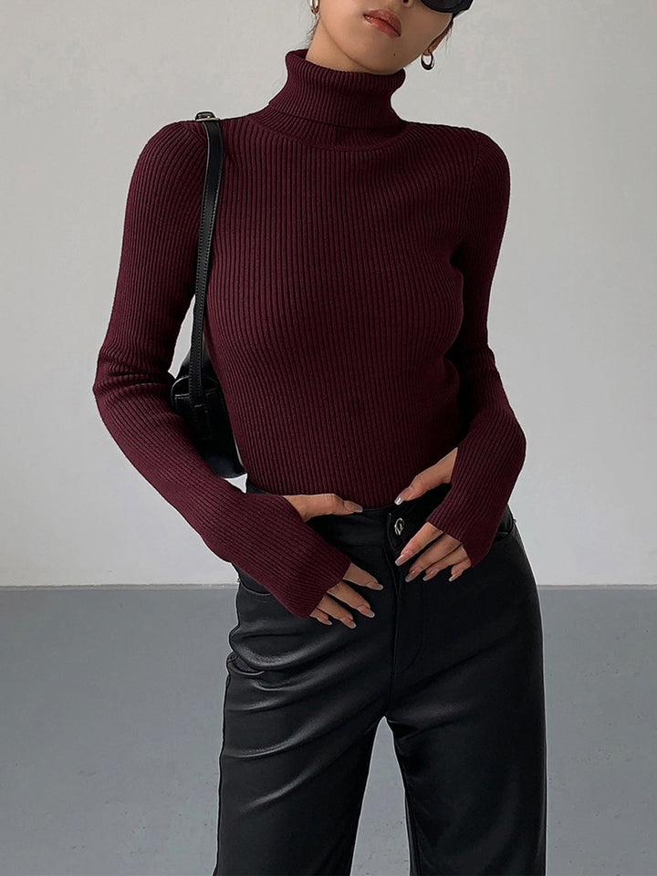 Casual yet chic women's ribbed turtleneck sweater in a versatile beige, ideal for everyday wear.