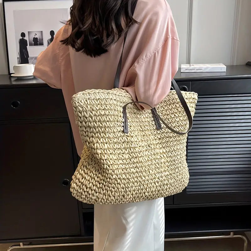Empty large straw tote bag for women, showcasing spacious interior for beach & summer items.