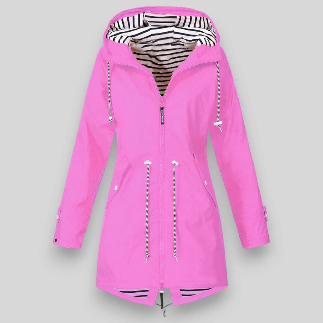 Fashionable women's hooded rain jacket. Lightweight, waterproof, and durable for versatile casual wear.