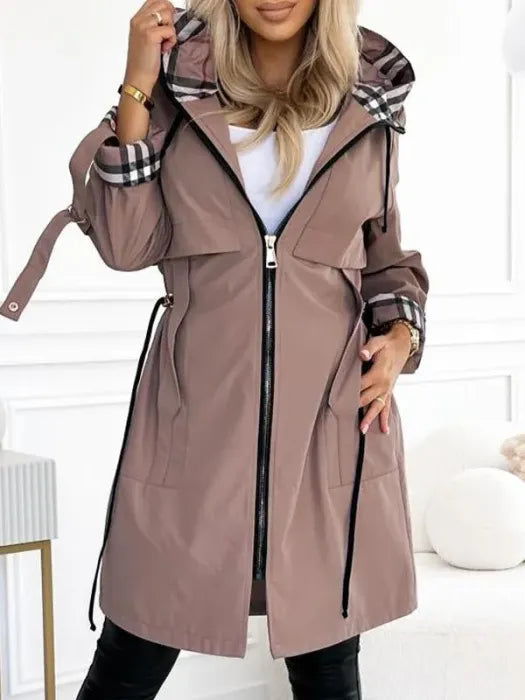 Women's stylish waterproof windproof zip coat, perfect all-weather outerwear with hood for fall and winter.