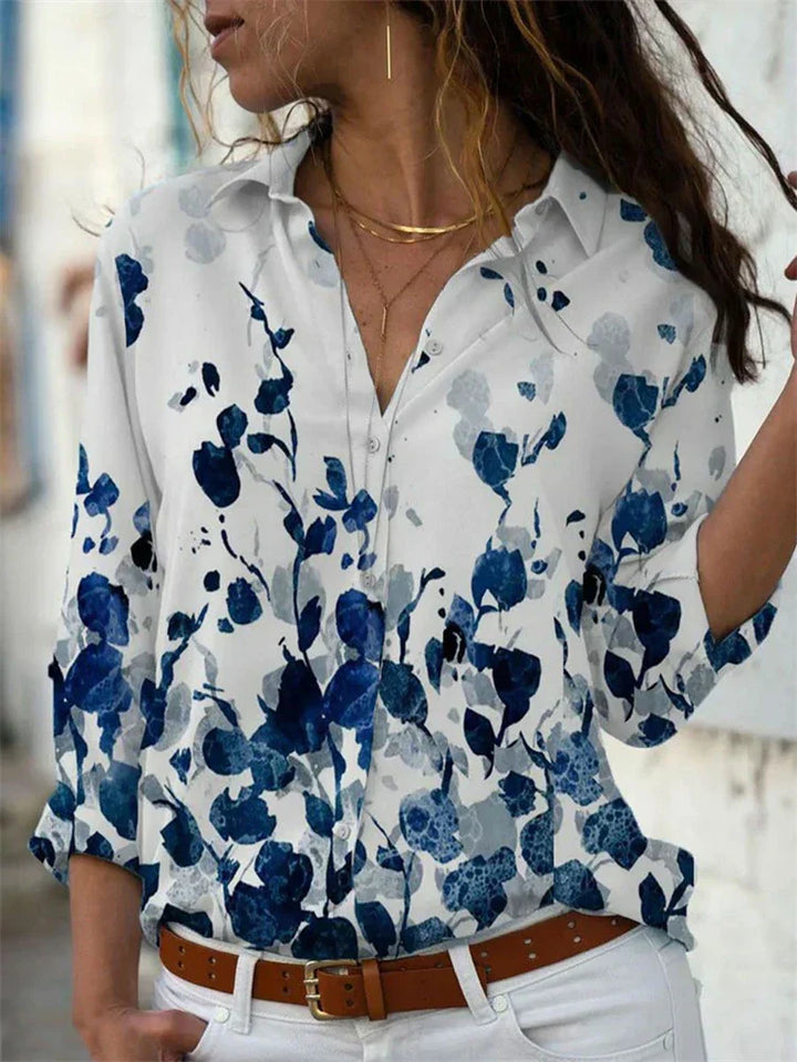 Women's summer blouse with a relaxed fit, perfect for elegant daily wear or casual chic occasions.