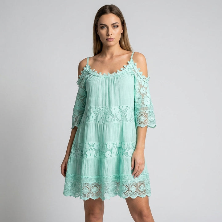 Women's summer mini dress with delicate crochet lace trim and stylish cold shoulder cutouts. Perfect for casual wear.