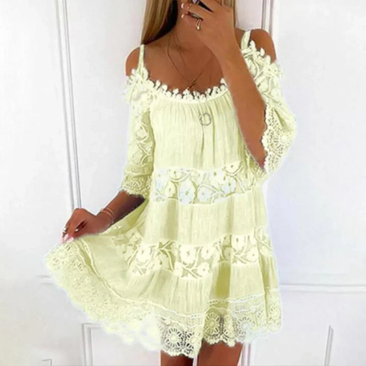 New women's casual summer mini dress, comfortable loose fit with cold shoulder, and charming crochet lace details.