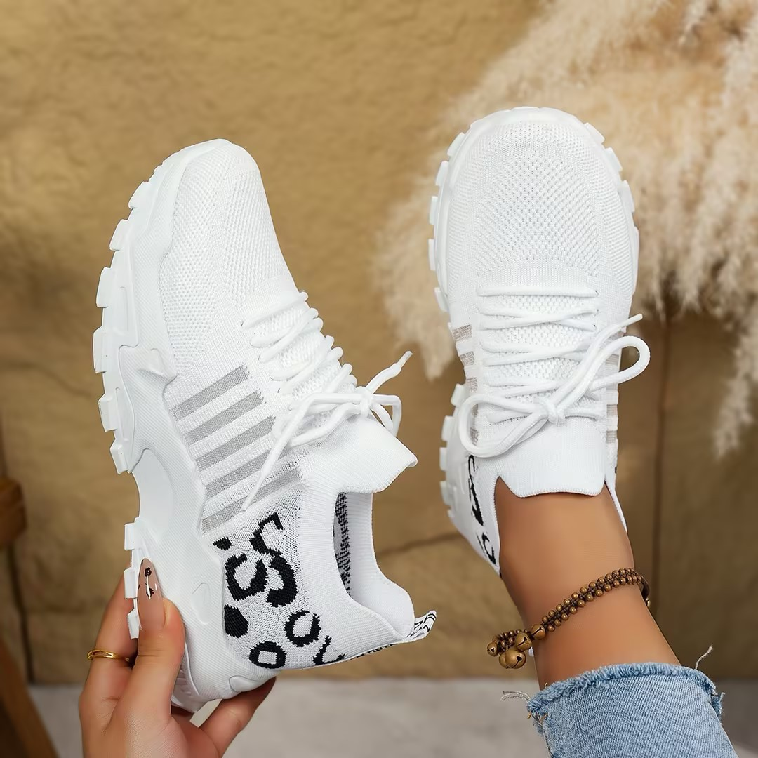 Breathable women's lace-up orthopedic sneakers, delivering exceptional support and comfort for active walking.
