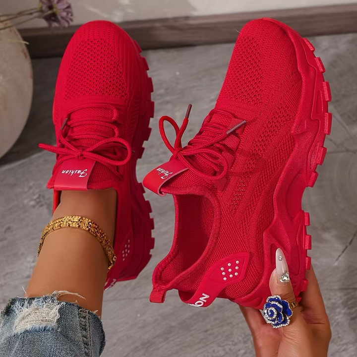 Stylish women's lace-up orthopedic sneakers offering ultimate comfort, support, and breathability for walking.